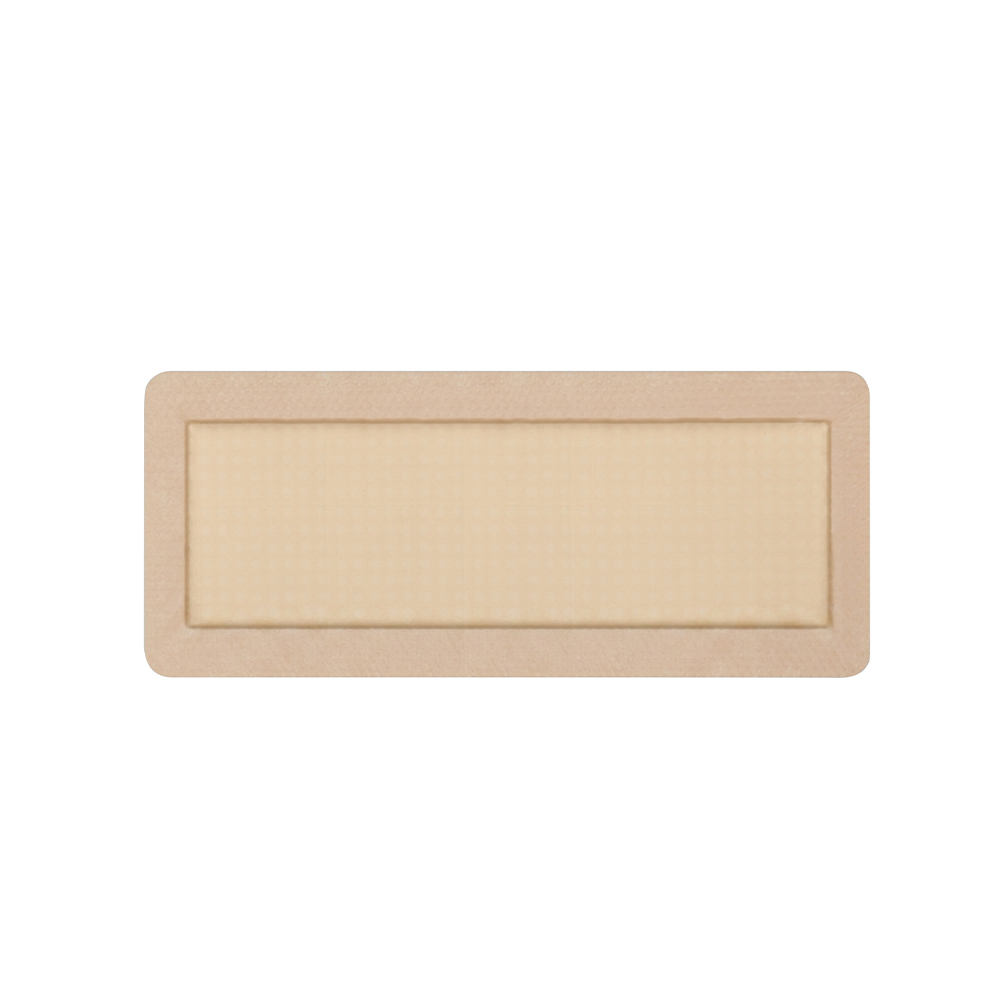 Dlouhý obdélníkový silikonový pěnový obvaz o rozměrech 30 x 10 cm